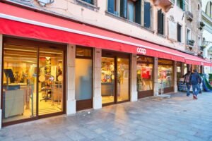 facade of coop supermarket in italian town