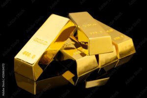 Come Funziona l'Oro da Investimento e Quali Vantaggi Offre 20 lingotti doro lucenti su sfondo nero